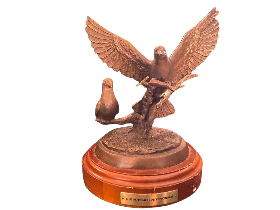 Bronze sculpture of two doves on a branch with wings spread on a round wooden base. - Vintage Bronze Sculpture "Under His Wings," Scott Stearman, Life Outreach International, Doves - Decoration Color_Brown, Decoration Price_under 100, Decoration Size_Medium, Decoration Style_Modern, Decoration Style_Traditional, Decoration_Bronze - Default Title - EZ Art, Decor & Jewelry
