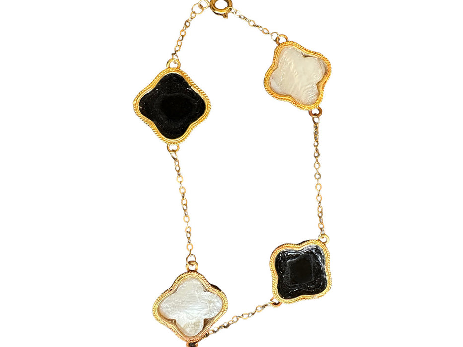 18k Gold Bracelet with Mother of Pearl and Onyx Clover , 4 motifs, 8.5”. 8.7g