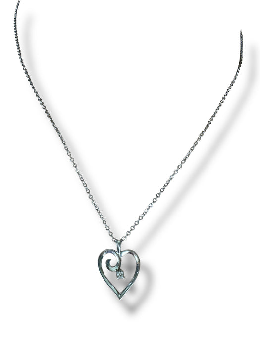 white gold heart  necklace with  blue sapphire 