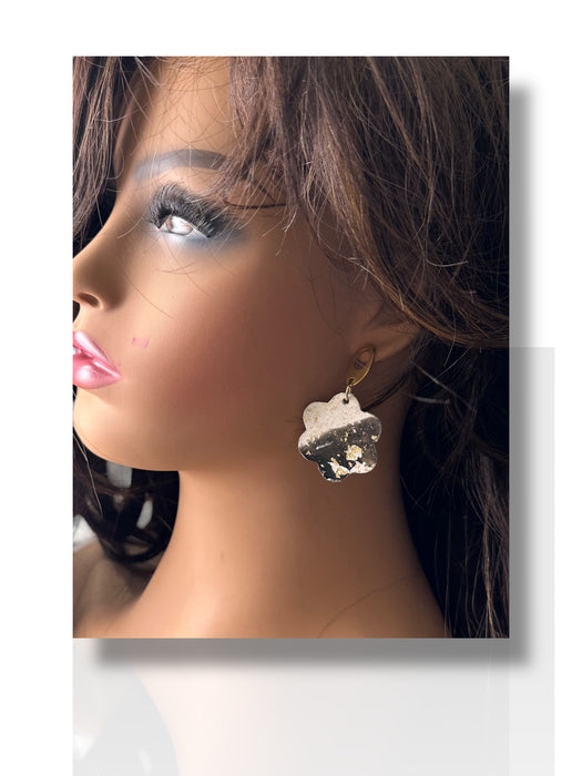 Handmade black and white polymer clay flower dangle earring on mannequin head. - Handmade Modern Earrings, Three Different Flower Design, Dangle Earrings, Black and White Earrings, Green and Gold Earrings, Polymer Clay Earrings - Black & White