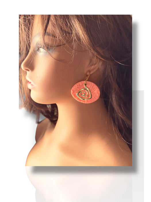 Peach-colored handmade polymer clay dangle earrings with gold textured spiral detail, 2 inches long. - Handmade Modern Earrings, Polymer Clay, Modern Textured Earrings, Statement Earrings, Dangle Earrings, Peach and Gold Earrings 2” - 2 Inch Earrings, Artisan Crafted, Boho Style, Fashion Accessories, Handmade Jewelry, Modern Earrings, Peach Earrings, Polymer Clay Jewelry, spring earrings, Statement Earrings, Textured Earrings, Trendy Jewelry, Unique Design - Default Title