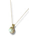 Gold necklace with pearl pendant on a white background