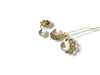Gold earrings with pearls on a white background
